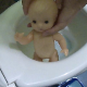 An attractive Eastern-European girl abuses her plastic doll by placing it in the toilet and taking a shit on top of it. See movies 6213, 6412, 8098 and 9009 for more. Over 7 minutes.